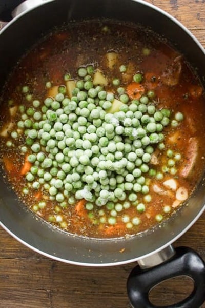 Peas in the pot with the other ingredients.
