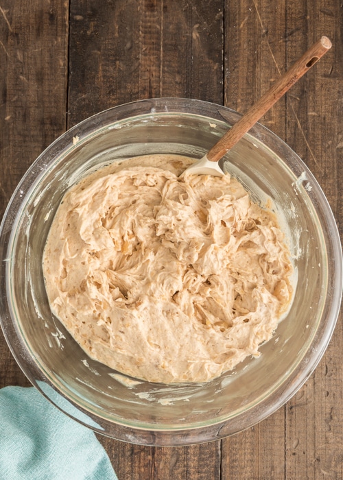 The dough mixed in the glass bowl.