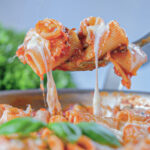 Baked pasta on a spoon.