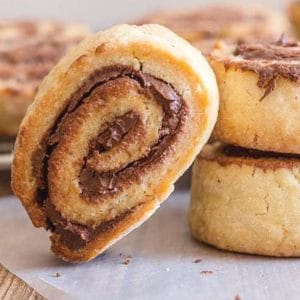 nutella pinwheel cookies one leaning on two stacked