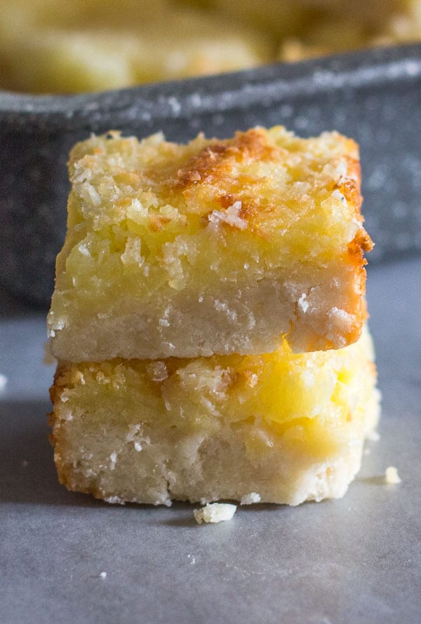 Easy Pineapple Coconut Squares, a buttery shortbread base and a delicious Coconut Pineapple filling makes this the perfect square.