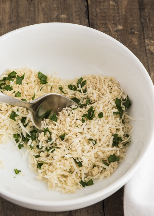 Making the topping in a white bowl.