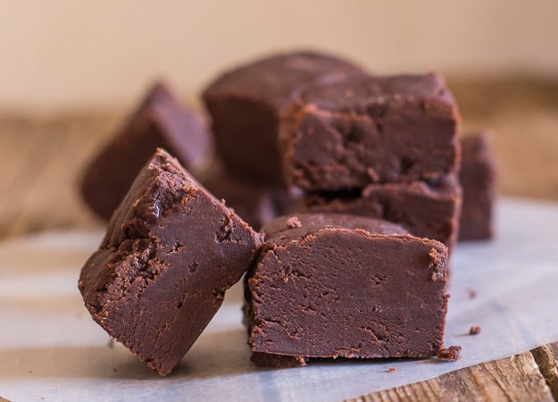 pieces of chocolate fudge, one leaning against another