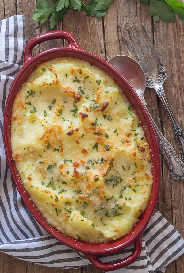 Double Cheese Mashed Potatoes, baked with mozzarella & parmesan cheese, Italian parsley the perfect side dish for Thanksgiving & Christmas. 