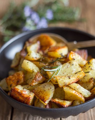 rosemary roasted potatoes in a black bowl