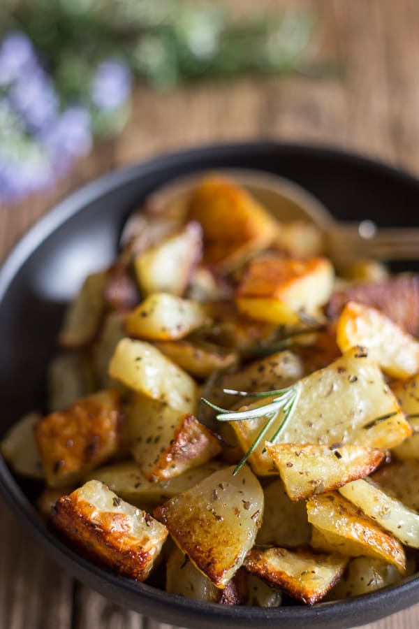 roasted potatoes in a black bowl