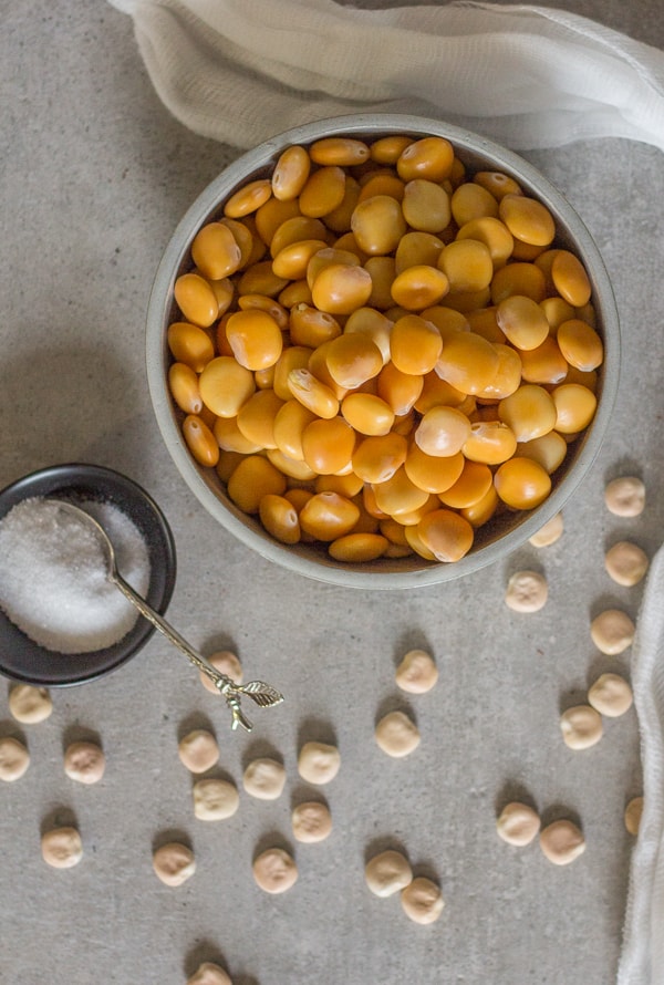 top photo of lupin beans in a bowl with dry ones beside it