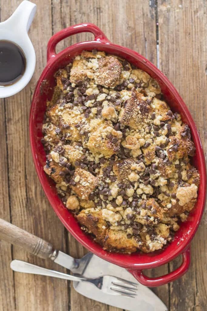 Panettone bread pudding in a red pan.