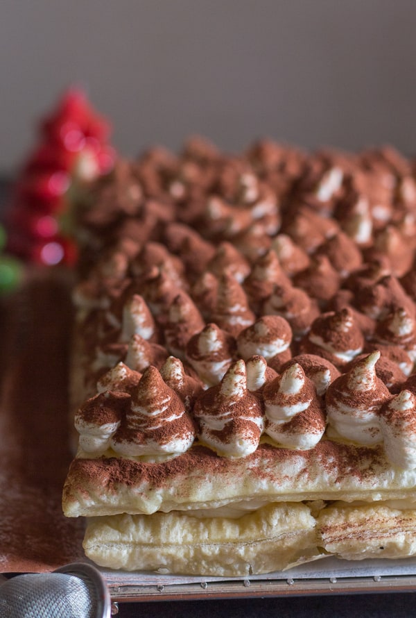 puff pastry tiramisu top view with sprinkled cocoa