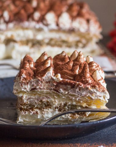 Easy Puff Pastry Tiramisu the traditional creamy Tiramisu filling layered between puff pastry and coffee dipped lady fingers.  The perfect no bake holiday dessert.