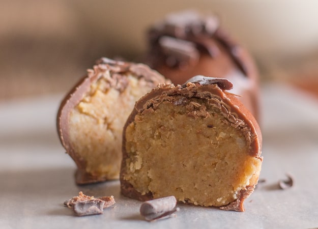 a tiramisu truffle cut and showing the filling