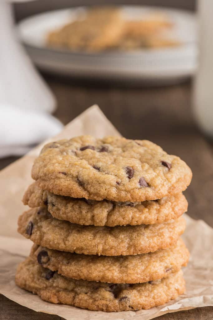 Six chocolate chip cookies stacked.