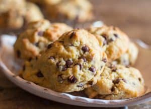 up close chocolate chip cookie on a white dish