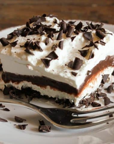 A slice of chocolate lasagna on a white plate.