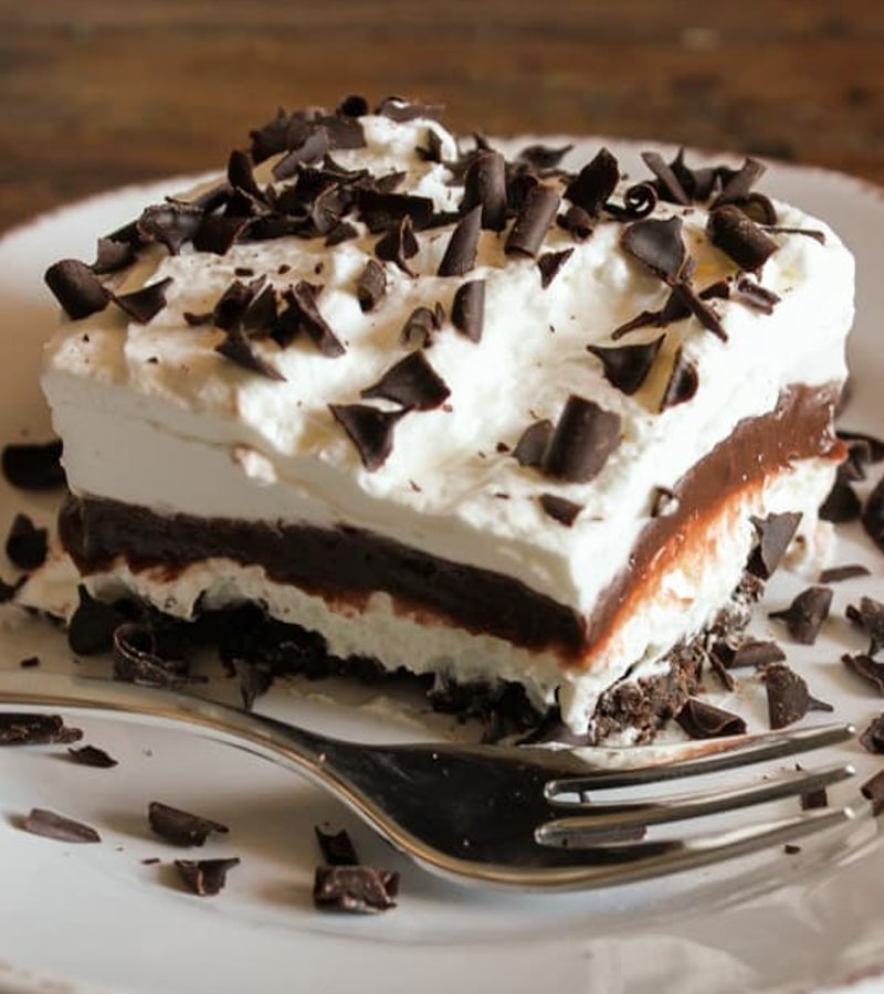 A slice of chocolate lasagna on a white plate.