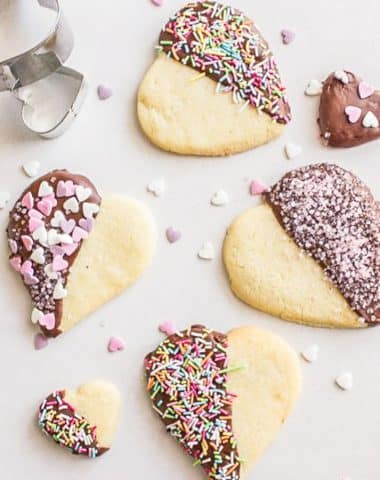 Dipped cookies on a white board.