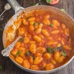 easy tomato sauce with gnocchi in a silver pan with a spoon