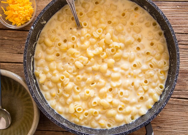 macaroni and cheese recipe in a black pan