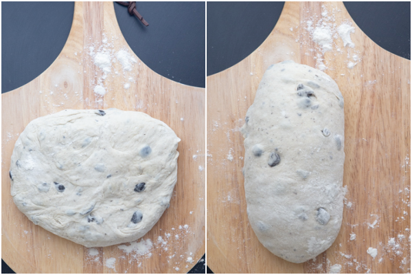 Dough kneaded and on a wooden board shaped & ready for rising.
