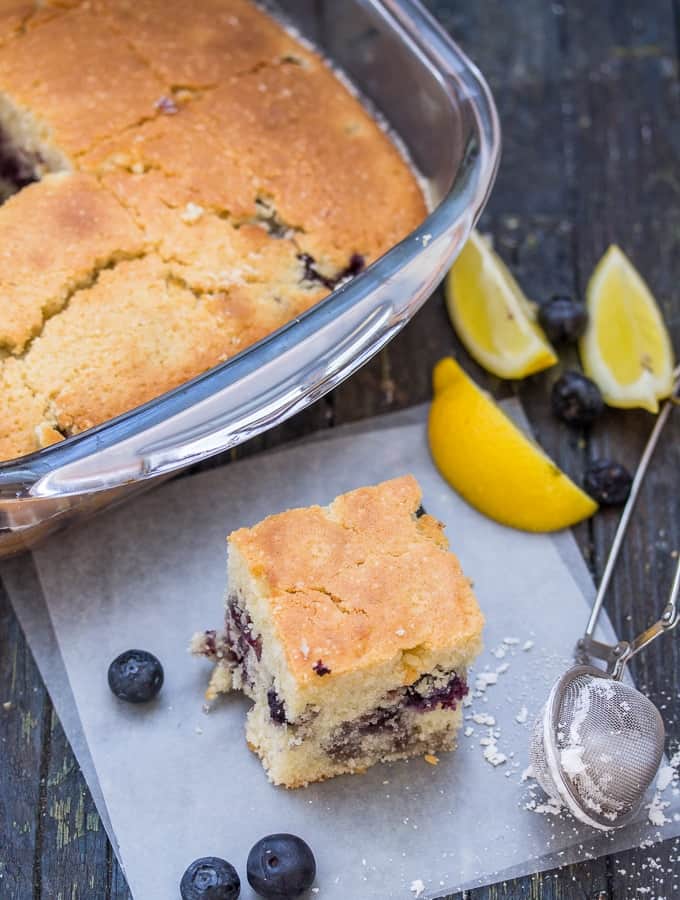 blueberry bars in the pan and one on the board