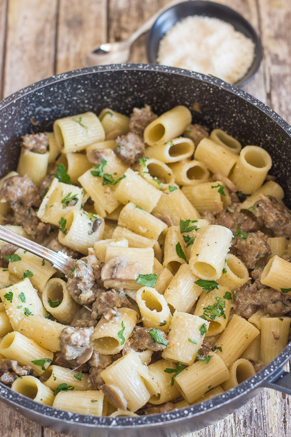 up close boscaiola pasta in a black pan