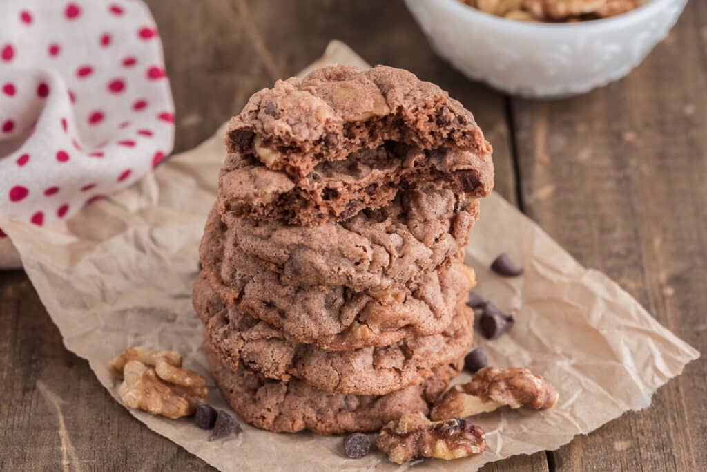 Cookies stacked with one cut in half.