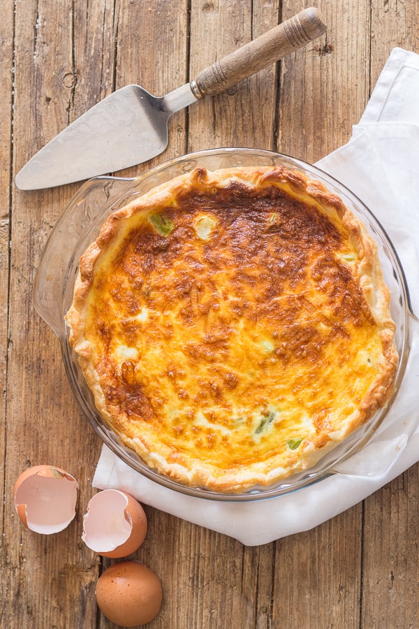 asparagus quiche baked on a wooden board
