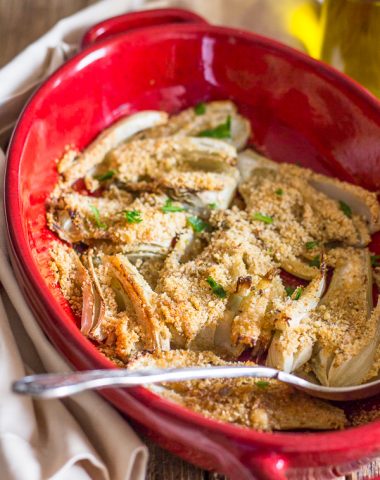 baked fennel in a red dish