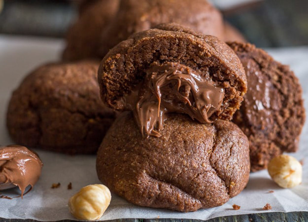 Nutella cookies with one cut in half.