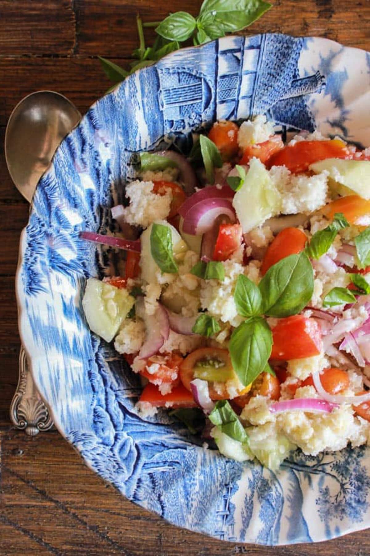 Panzanella in a blue bowl.