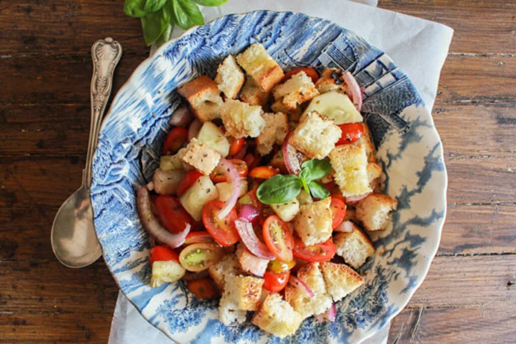 Panzanella in a blue bowl.