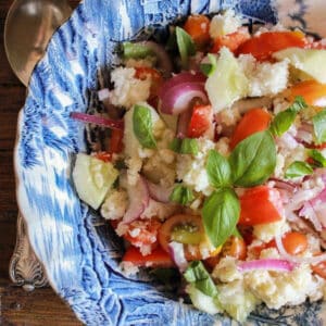 Panzanella in a blue bowl.