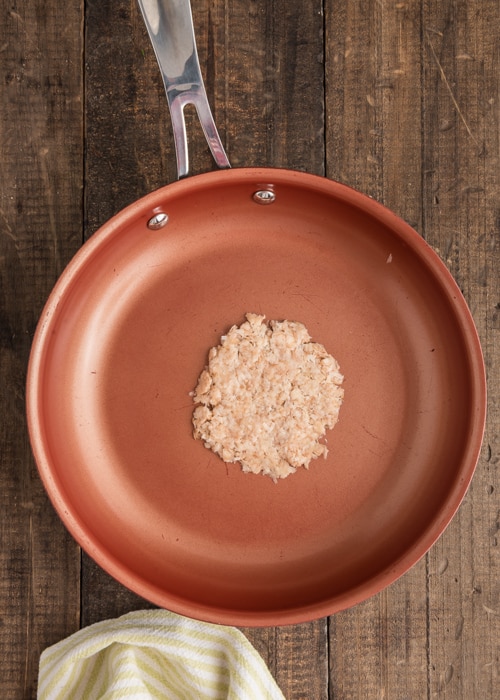 Cooking the potato basket in the pan.