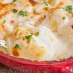 a spoon of simple scalloped potatoes