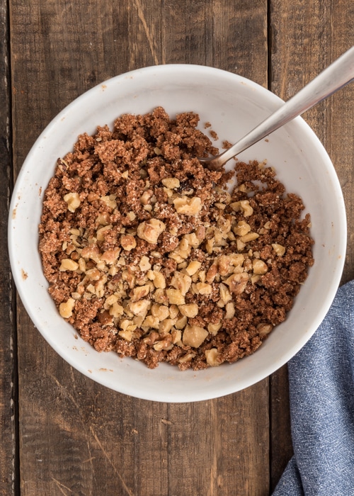 The streusel topping in a white bowl.
