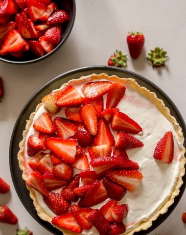fresh strawberry pie on a white board