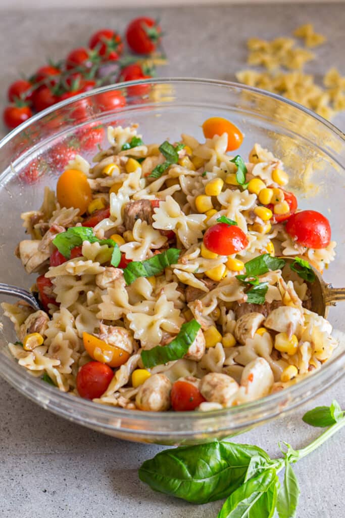 Butterfly pasta in a glass bowl.