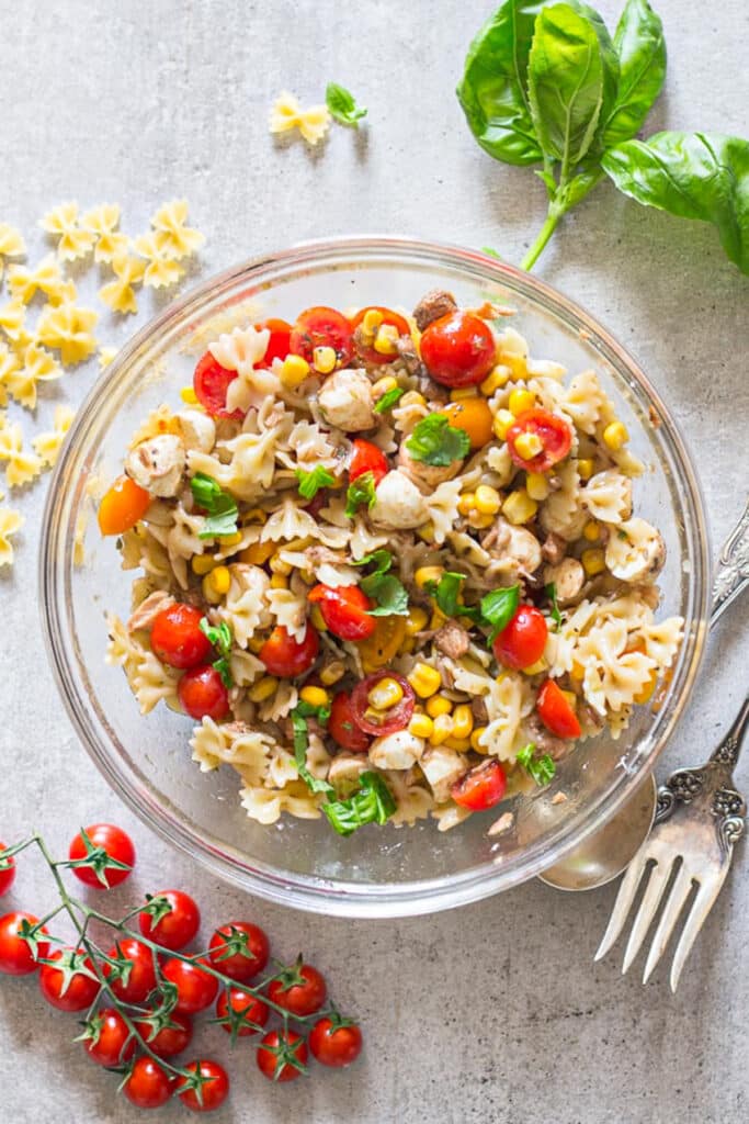 Pasta salad in a glass bowl.