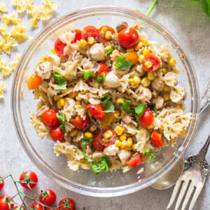 Butterfly pasta in a glass bowl.