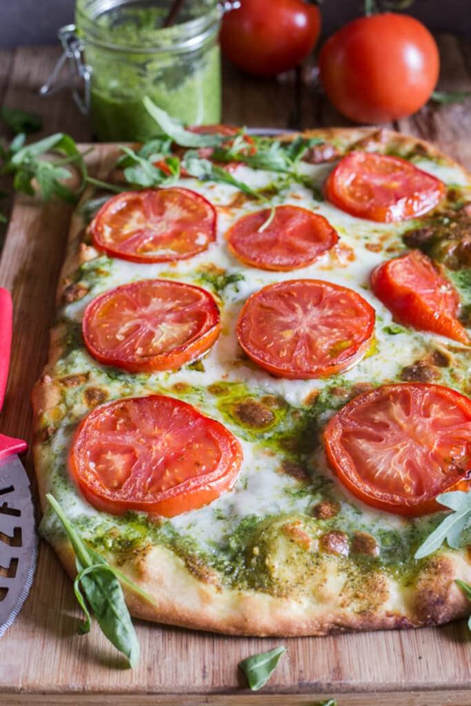 Pizza on a wooden board.