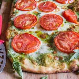 Pizza on a wooden board.