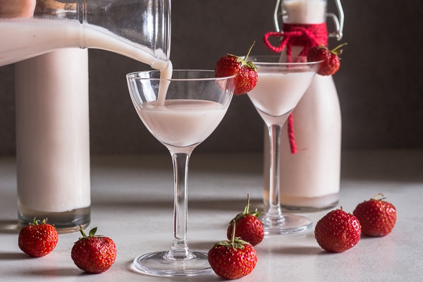 Creamy Strawberry Liqueur pouring into a glass