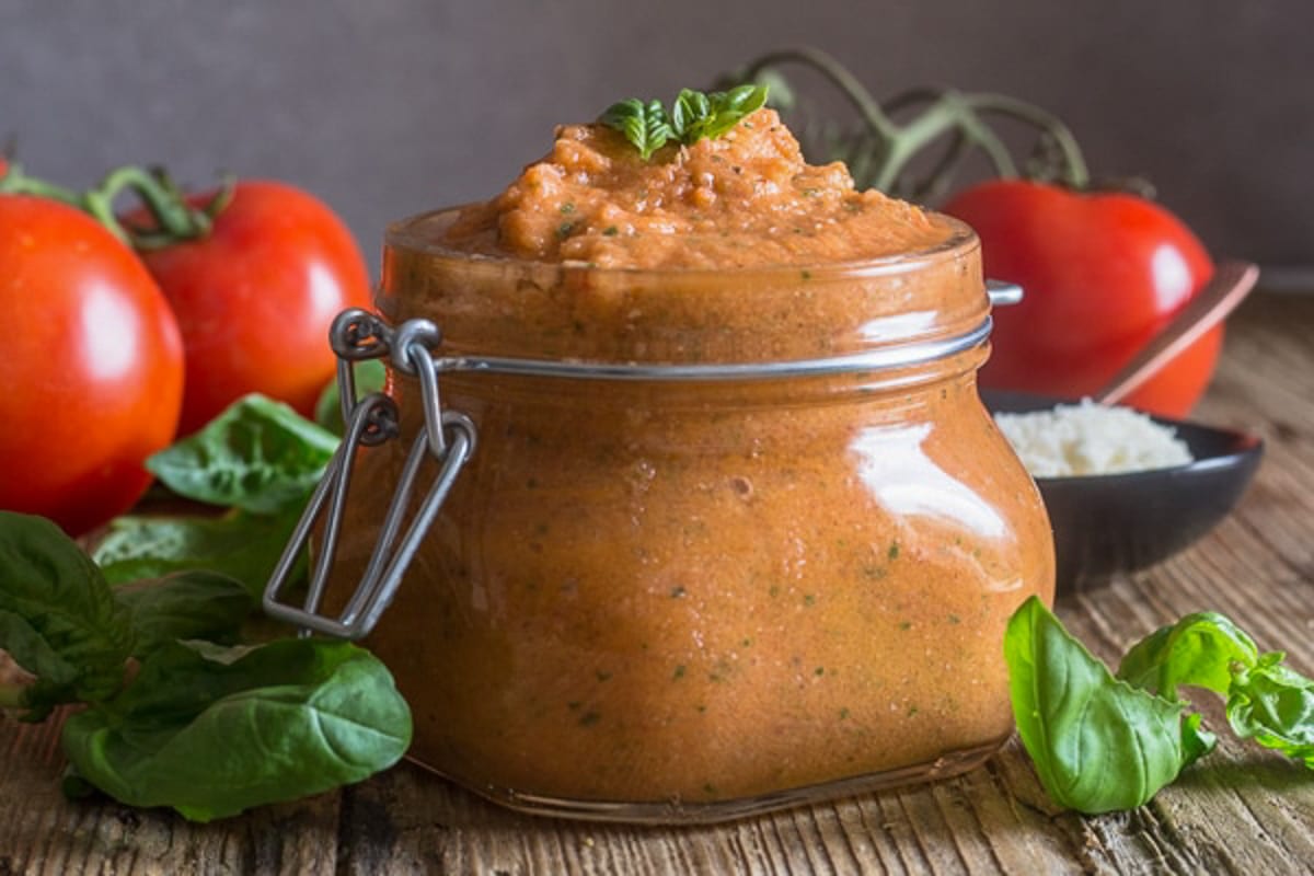 Pesto in a glass jar.