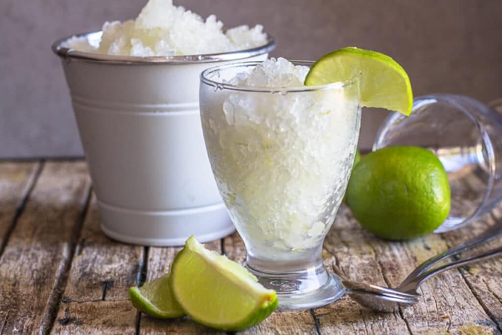 Granita in a glass and a white bucket.