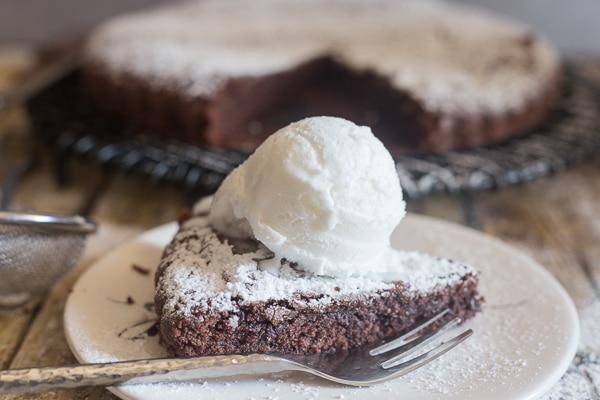 brownie cake slice on a white plate