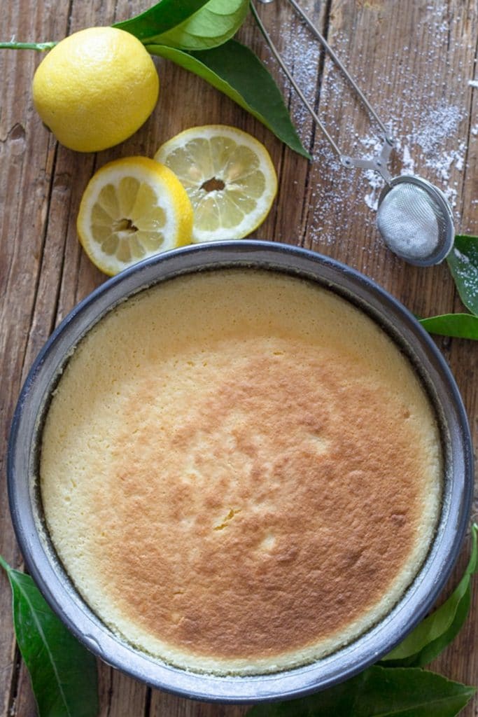 Lemon pudding cake baked in the black cake pan.