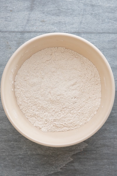 Whisked dry ingredients in a white bowl.