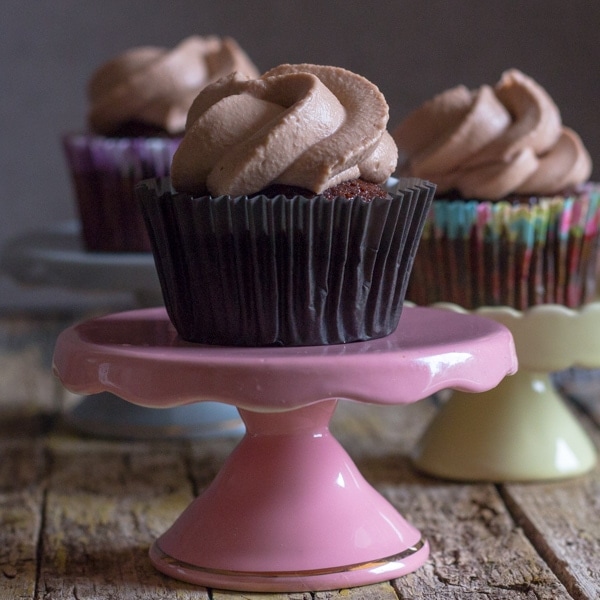 chocolate cupcake on a pink stand