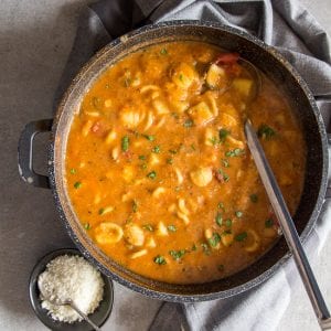 hearty chickpea soup in a black pot