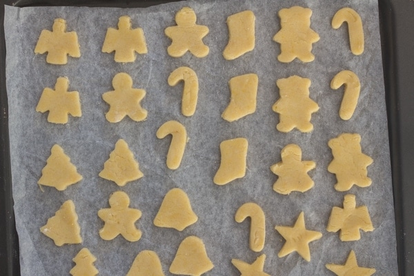 cut out almond cookies ready for baking